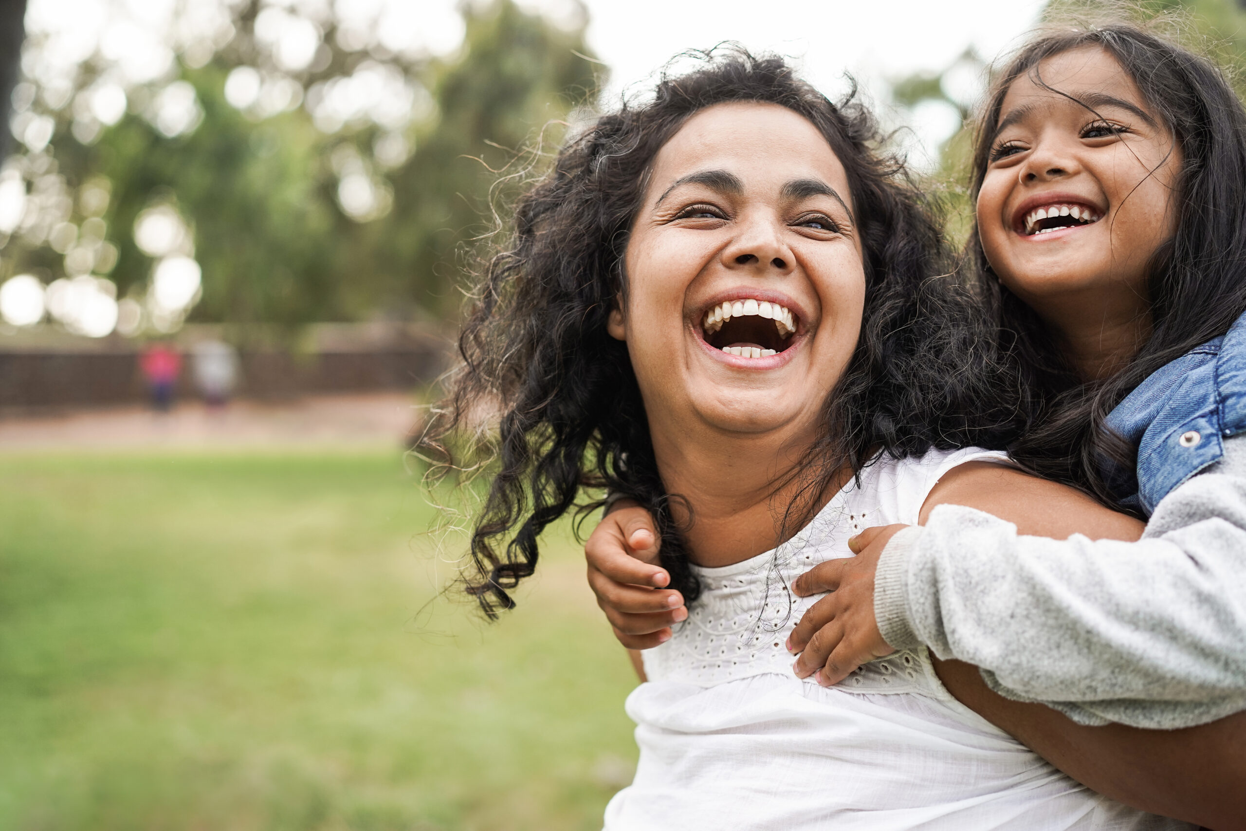 Happy,Indian,Mother,Having,Fun,With,Her,Daughter,Outdoor,-